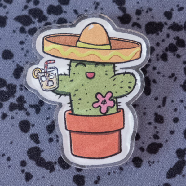 Kaktus mit Sombrero und Cocktail